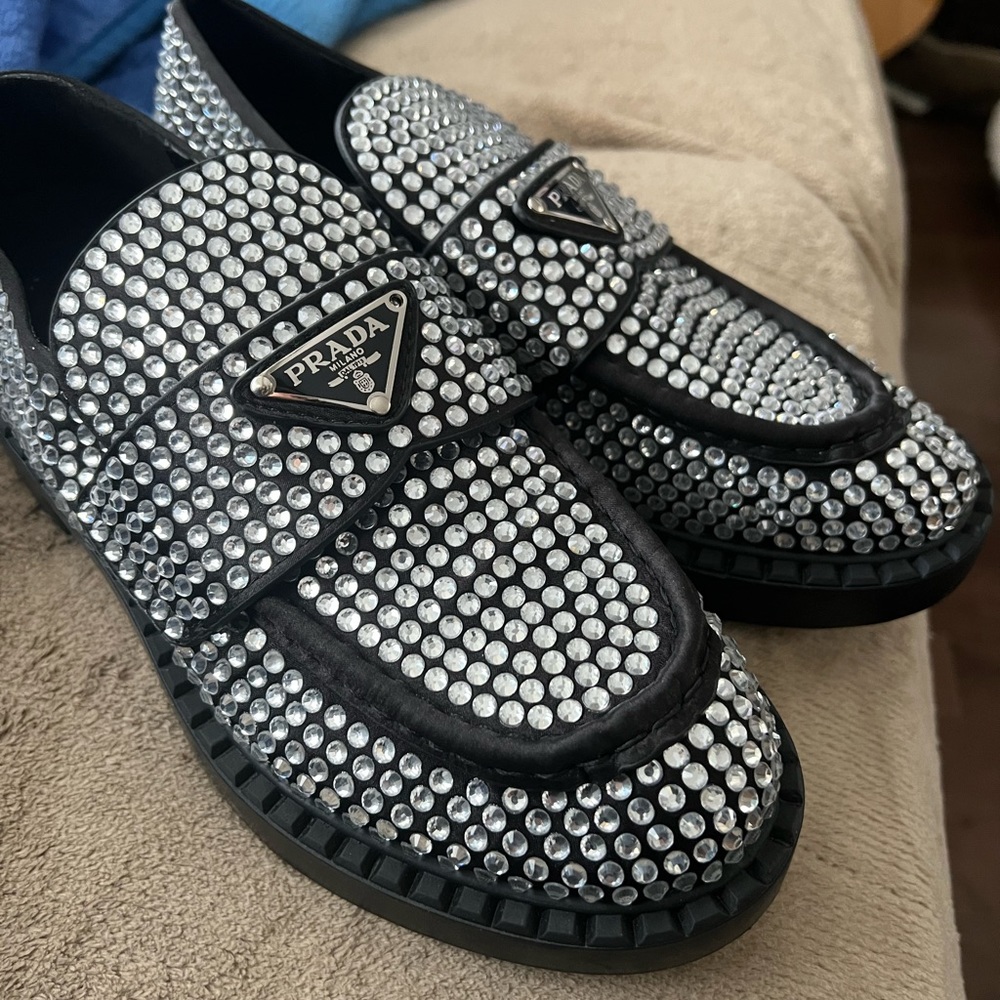 Brand new loafers with crystals. Never worn. Size 40 but fit like a 38-39.